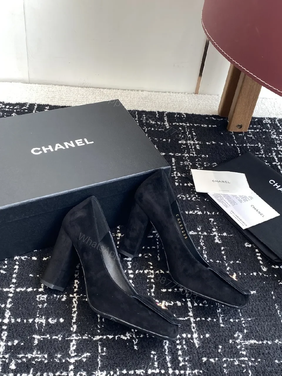 View 4 of Elegant Black Suede Pumps with Logo Detail Leather Heel