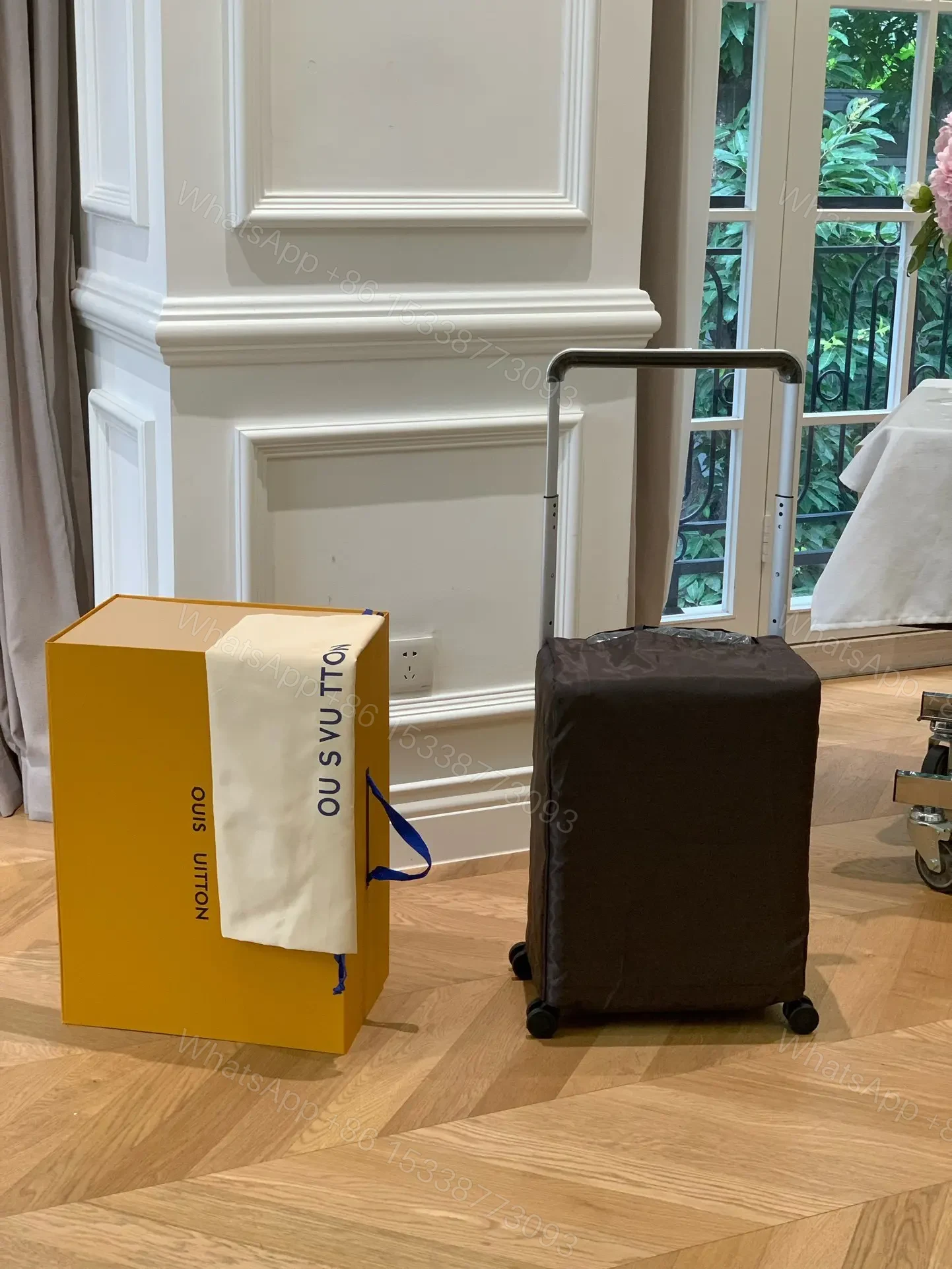 View 5 of Louis Vuitton Horizon 55 rolling suitcase in Damier Ebene canvas.