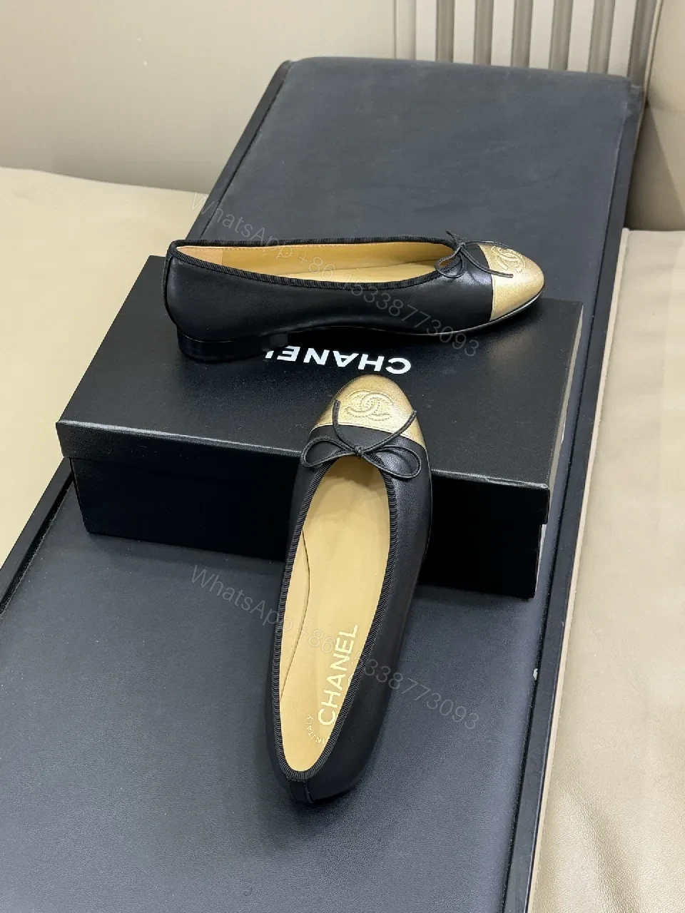 View 5 of Black Leather Ballet Flats with Gold Cap Toe, Sleek, Comfortable, Designer-Inspired