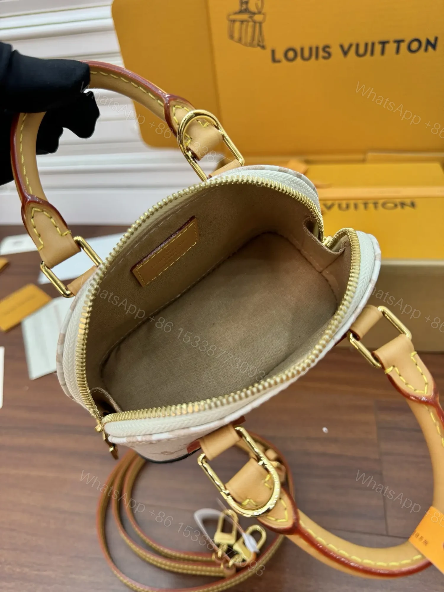 View 4 of Louis Vuitton Nano Alma handbag in Monogram Dune canvas