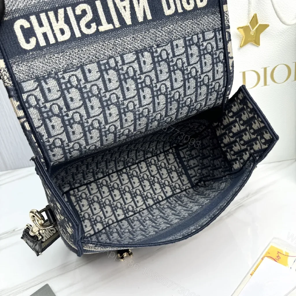 View 2 of Compact Monogram Crossbody: Luxe, Structured, Everyday News