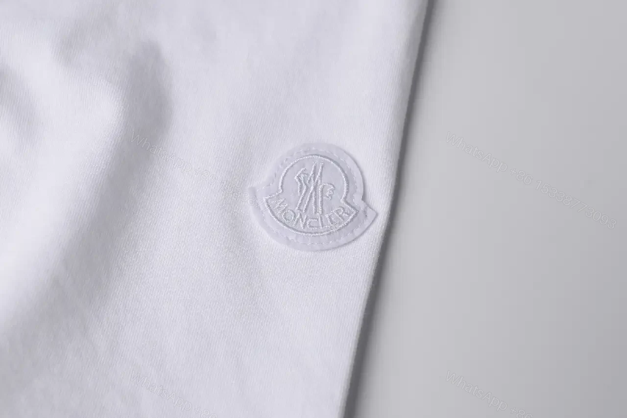 View 6 of White Cotton Moncler Tee: Subtle Luxury Everyday Comfort