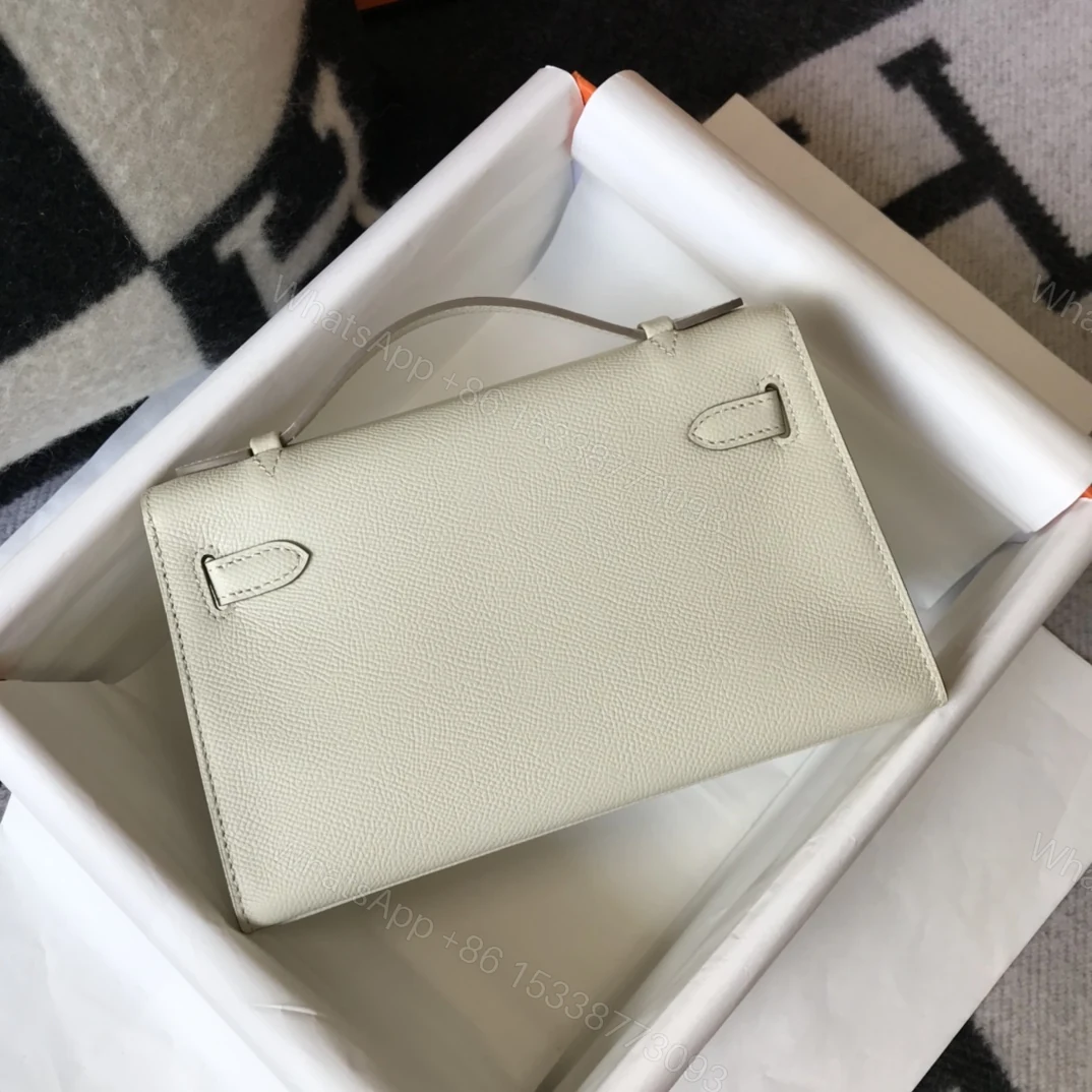 View 4 of HERMES MINI KELLY POCHETTE GOLD TONED HARDWARE WHITE 22CM