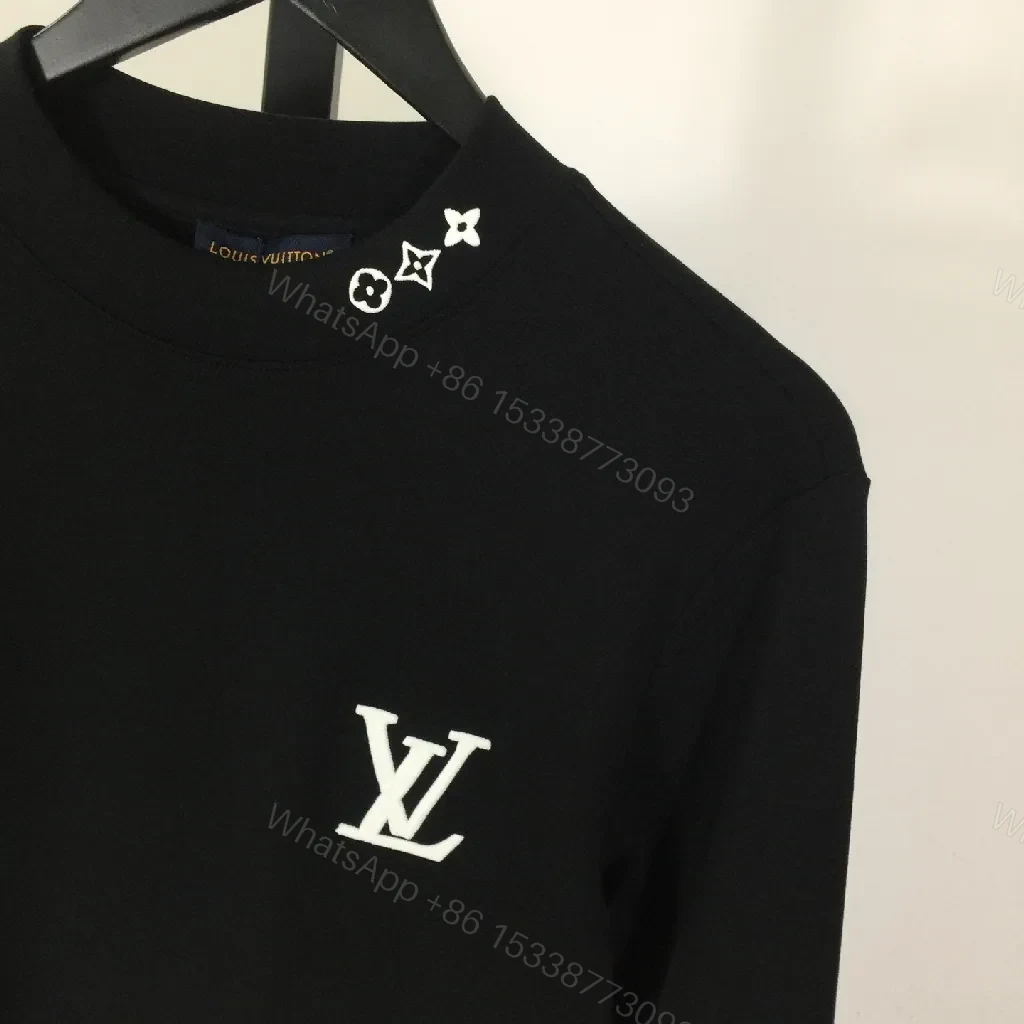 View 8 of Minimalist Black Sweatshirt with Subtle Monogram Accent