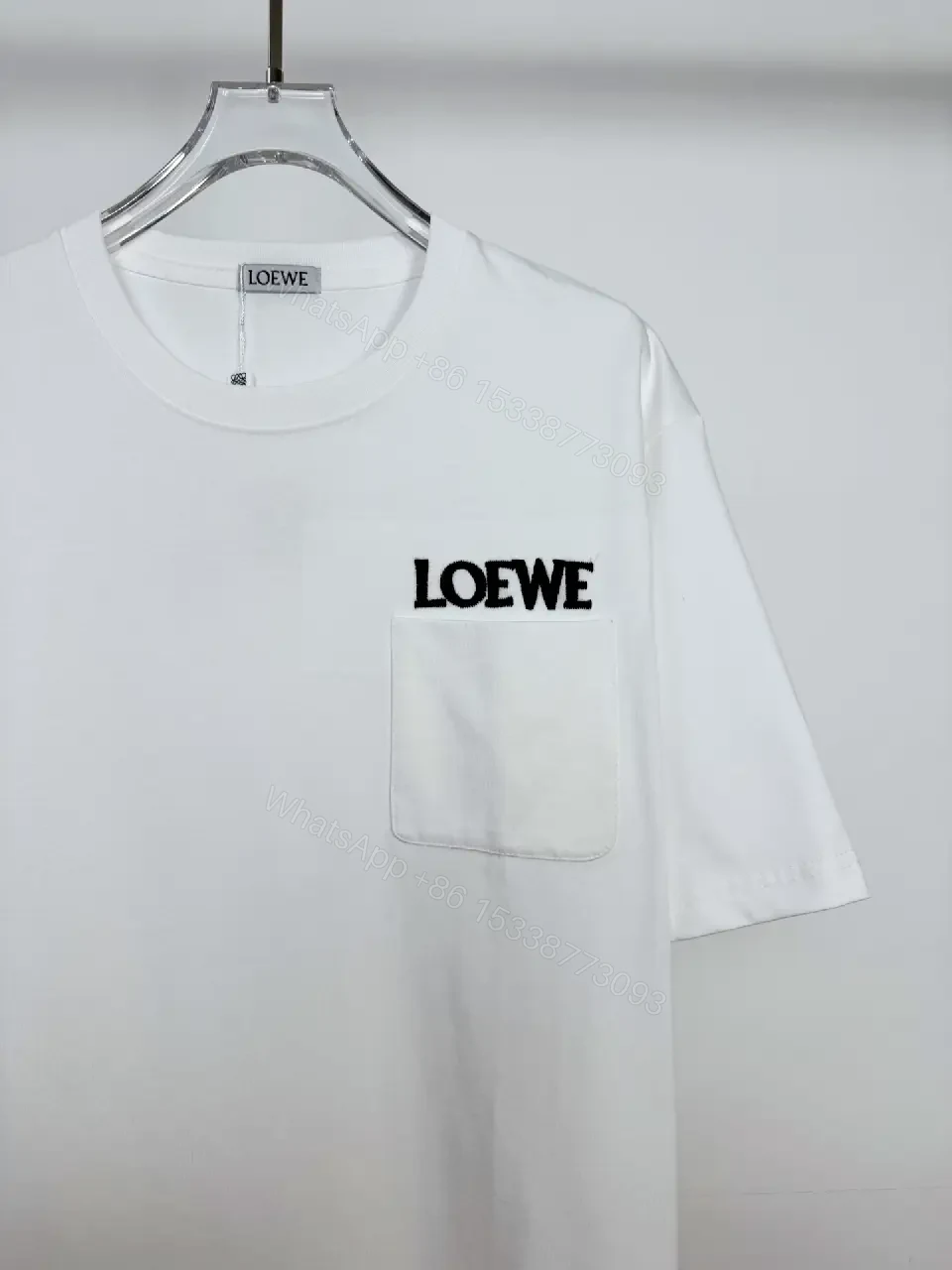 View 6 of Minimalist White Cotton Tee with Bold Pocket, Everyday Luxury Top