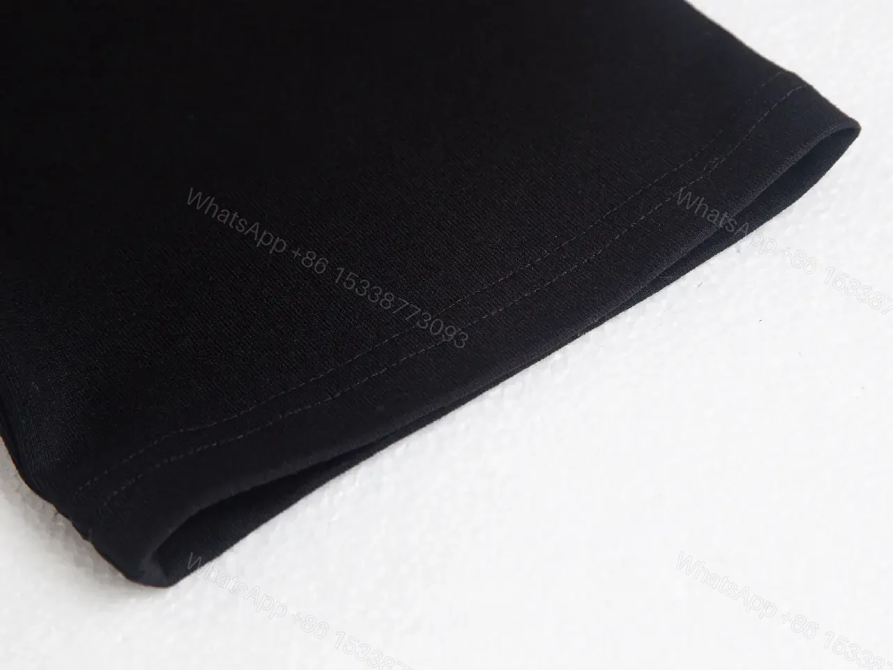 View 8 of Minimalist Black Tee: Luxe Subtlety, Durable Everyday Top
