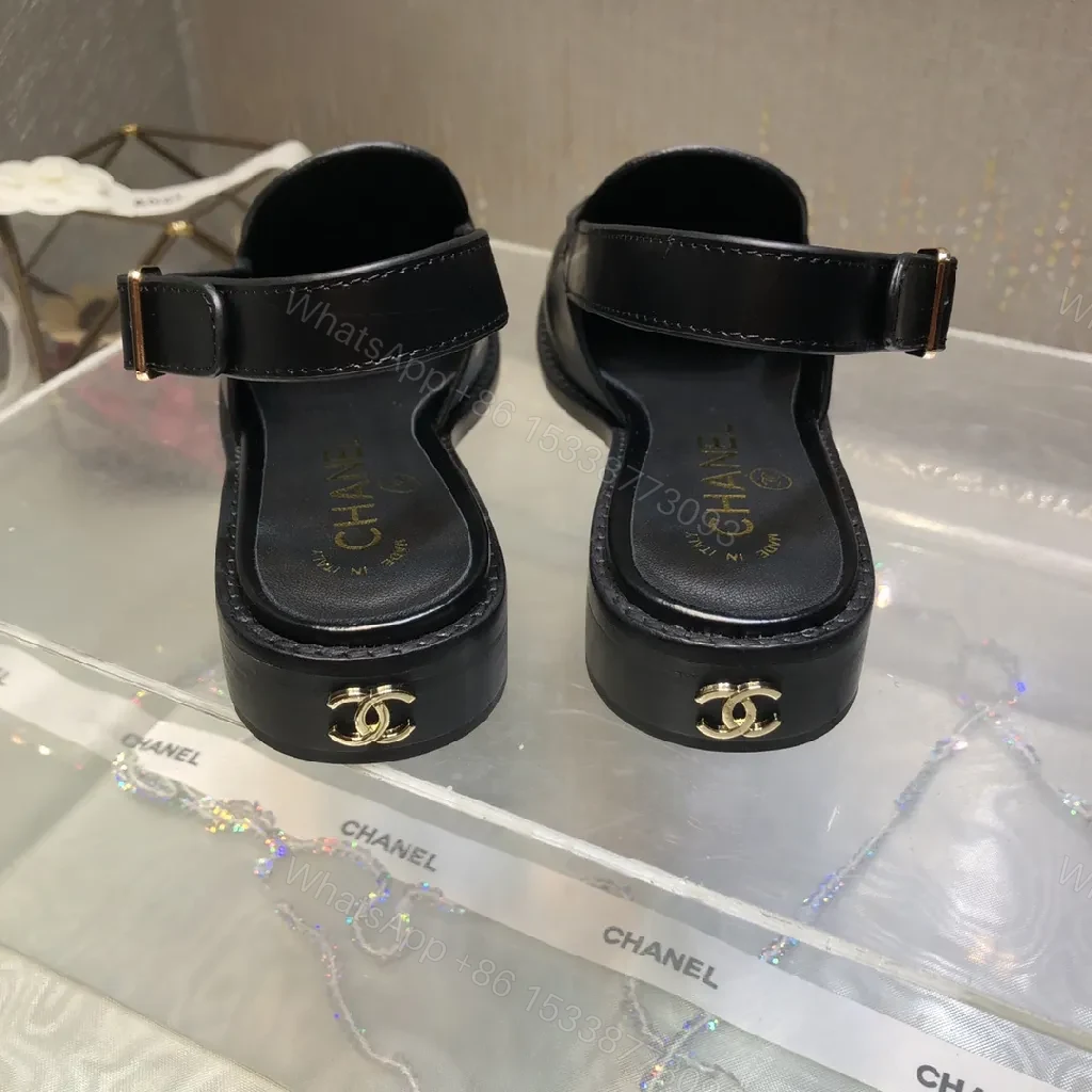 View 9 of Black Leather Mules with Gold Logo Hardware, Minimal Slider Mule