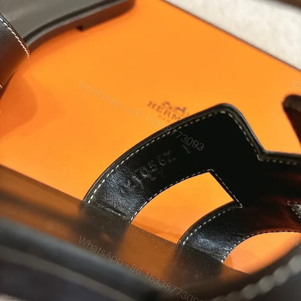 View 8 of black leather slide sandals with H-shaped buckles for luxury everyday