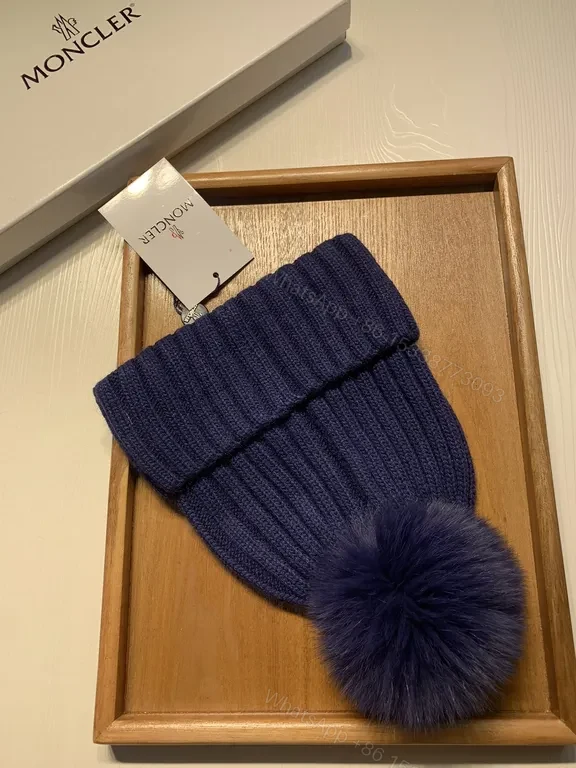 View 9 of Navy Rib Knit Beanie with Plush Pomâ€”Moncler Luxe Gift Box
