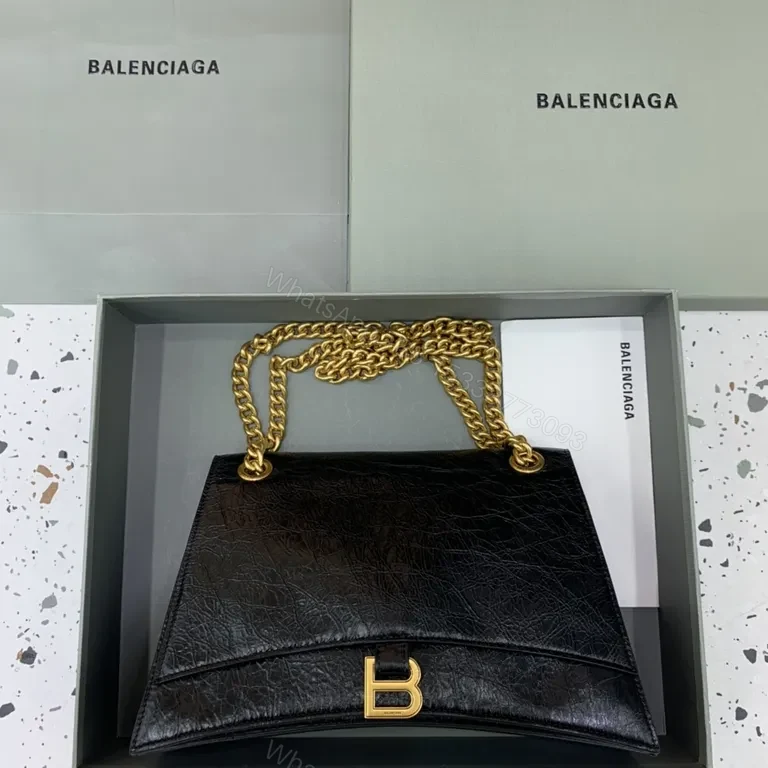 Structured Black Leather Crossbody Bag with Gold Chain — view 1