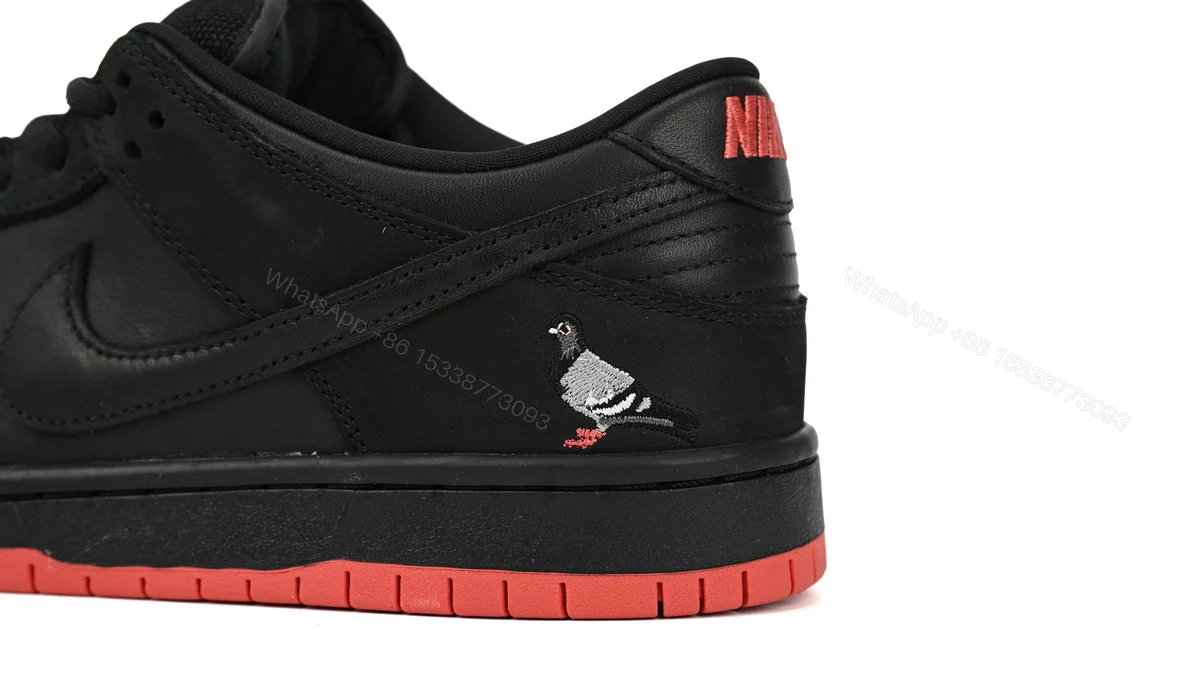 View 9 of Nike Dunk SB Low Black Pigeon 883232-008