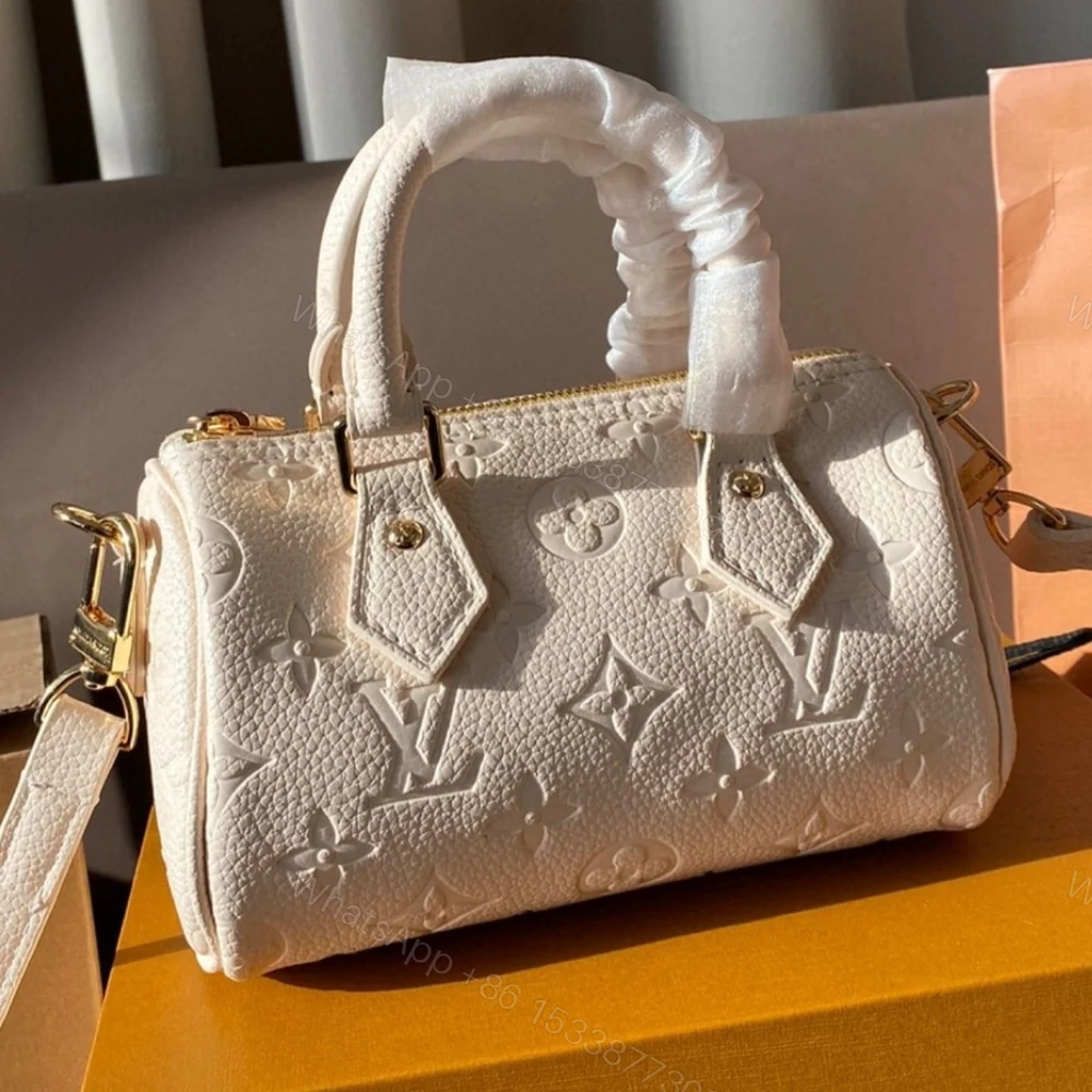 View 2 of Louis Vuitton Speedy Bandoulière Bag 20 Cream 20Cm M58954