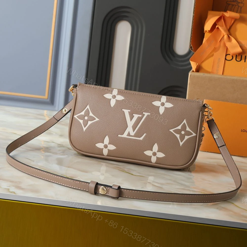 View 3 of Louis Vuitton Multi Pochette Accessoires Monogram Empreinte Greige 25Cm