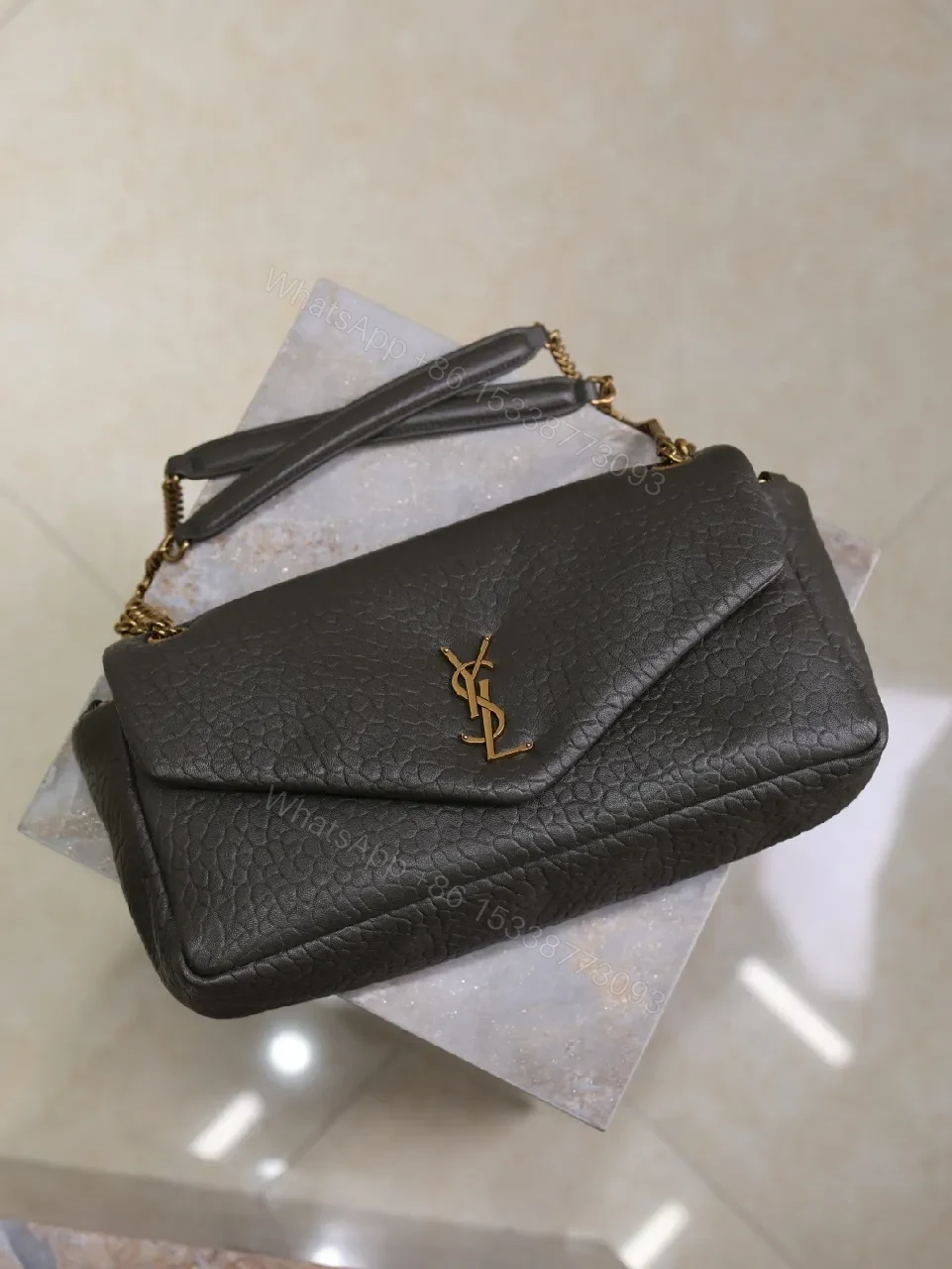 View 6 of Textured Leather Envelope Bag: Black + Gold Accent, Compact Luxury Shoulder Bag
