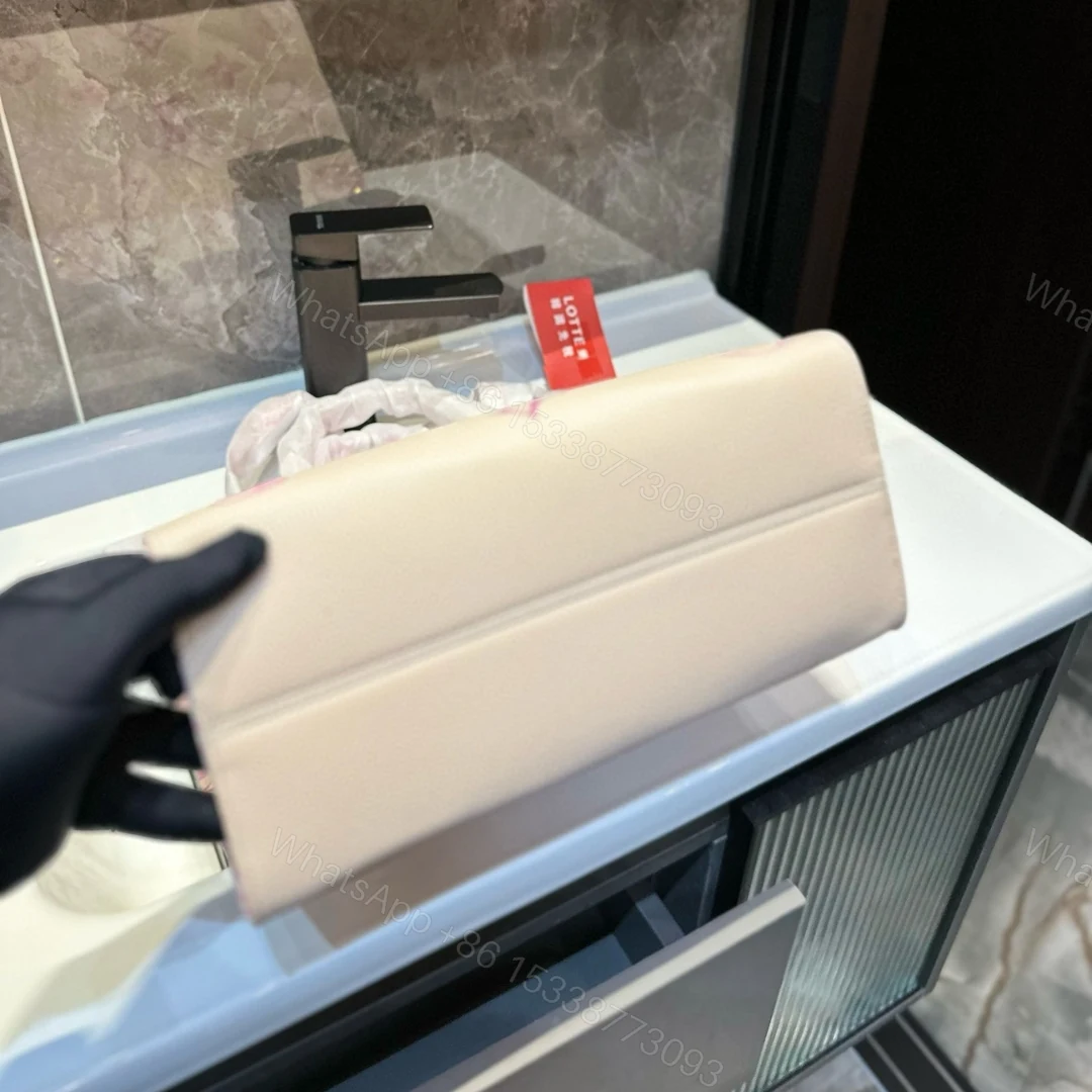 View 6 of LOUIS VUITTON BY THE POOL ON THE GO PM TOTE BAG PINK 34CM M22976