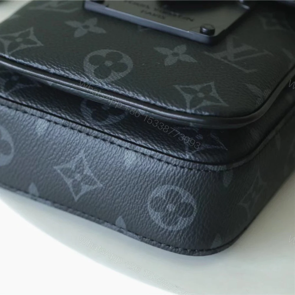 View 5 of Louis Vuitton S-Lock Vertical Wearable Wallet Monogram Eclipse 19cm