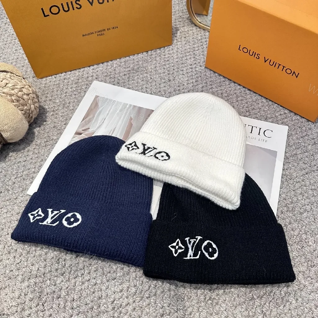 View 2 of White Knit Beanie – Luxe Logo Detail, All-Season Comfort