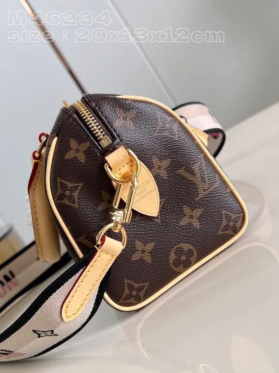 View 2 of Structured Monogram Mini Tote: Compact, All-Season Luxury
