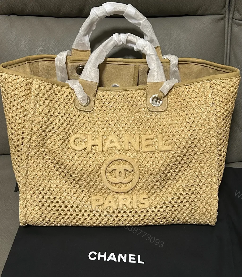 Natural Straw Tote in Beige with Leather Trim, CHANEL-Embossed, Open-Top Tote — view 1