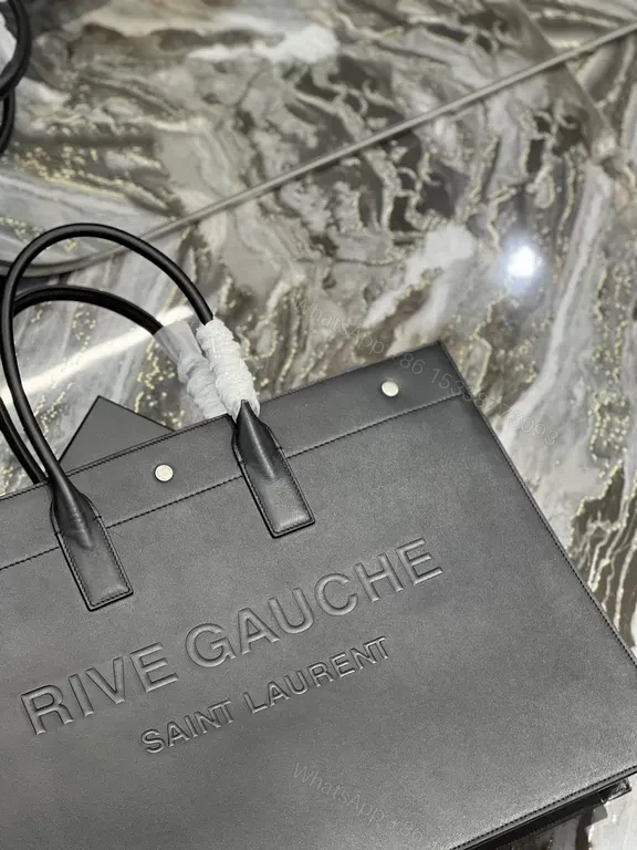 View 6 of Structured Minimalism: Leather Tote with Embossed Branding (60)