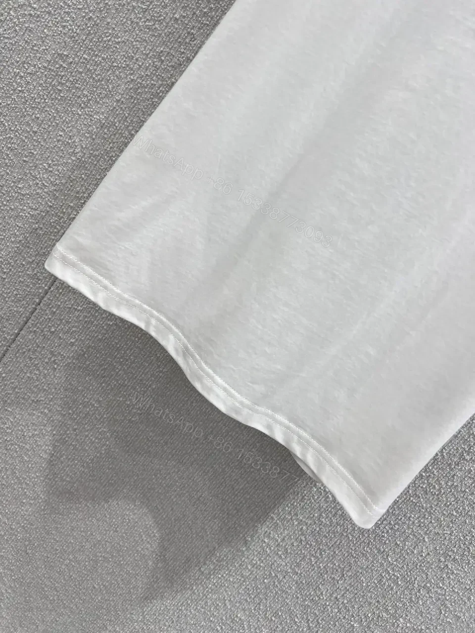 View 2 of Minimalist White Cotton Tee with Crest – Everyday Luxe T‐Shirt