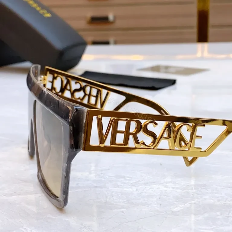 View 8 of Bold Black & Gold Luxe Sunglasses - Statement Frame, All-Day Comfort