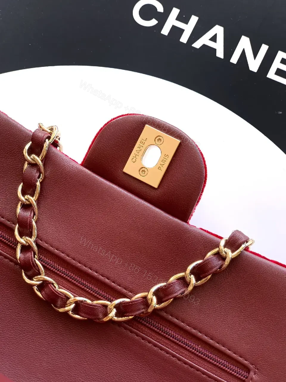 View 6 of Rich Velvet Red Flap Bag with Gold Chain Embellishment