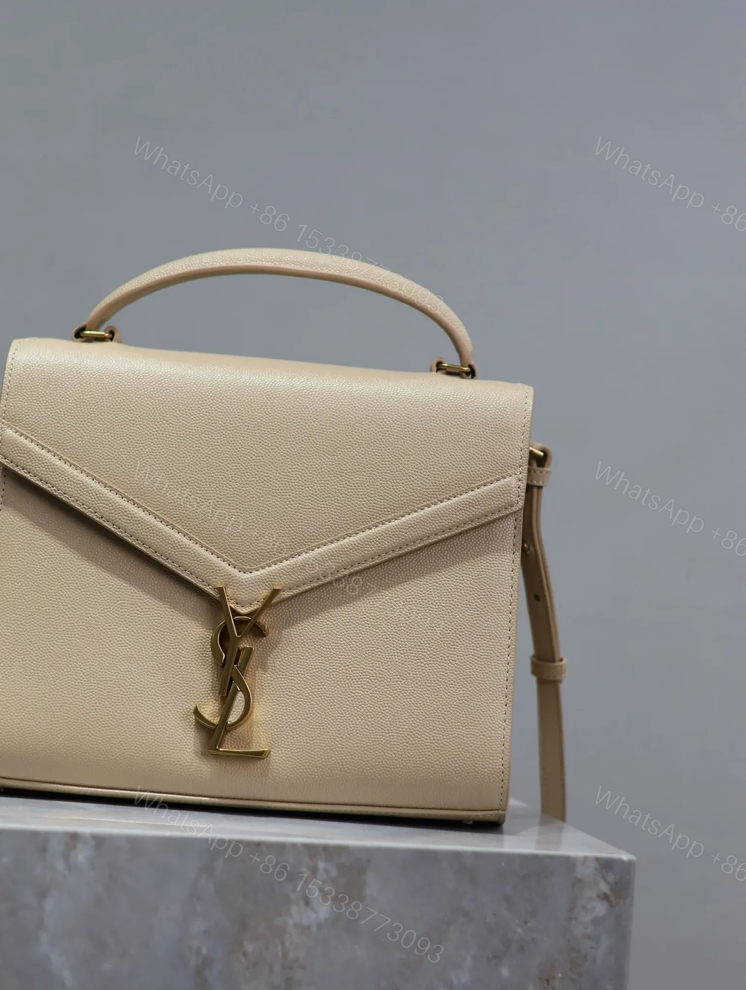 View 6 of YSL CASSANDRA TOP HANDLE BAG MEDIUM IN BEIGE CALFSKIN GOLD HARDWARE