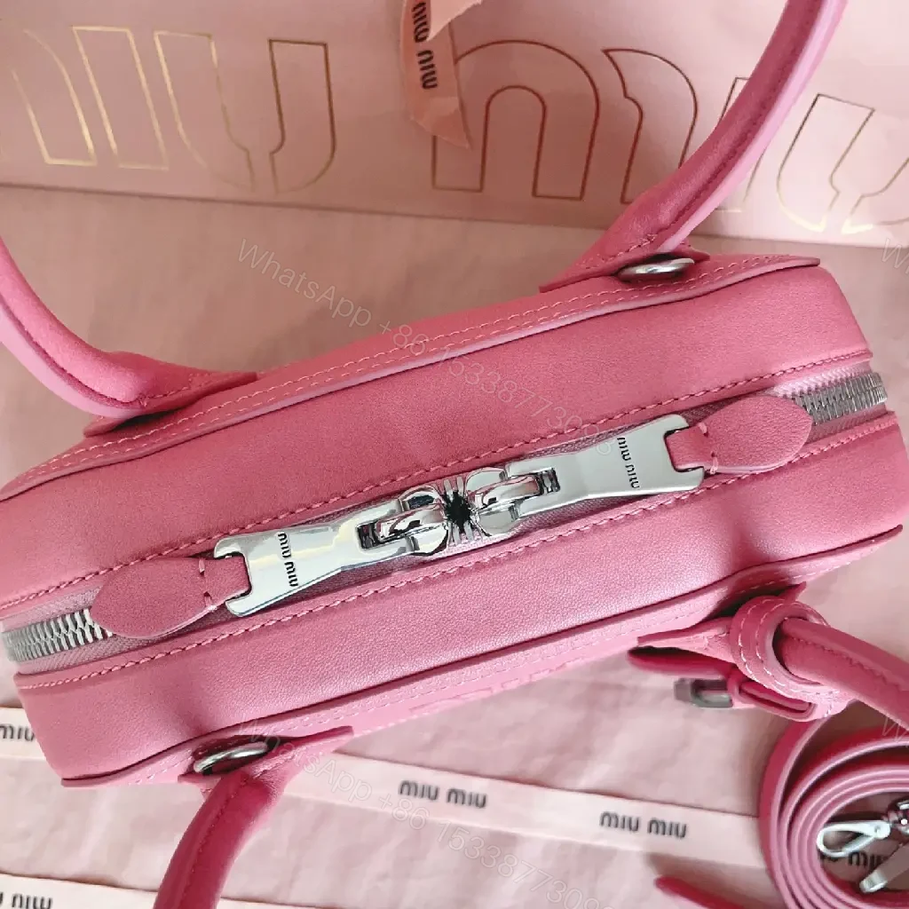 View 10 of Light Pink Leather Dome Satchel: Top-Handle Bag with Shoulder Strap
