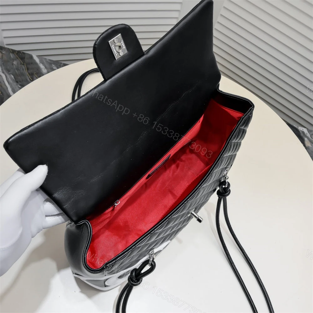 View 5 of CHANEL Black Lambskin Cambon Handbag