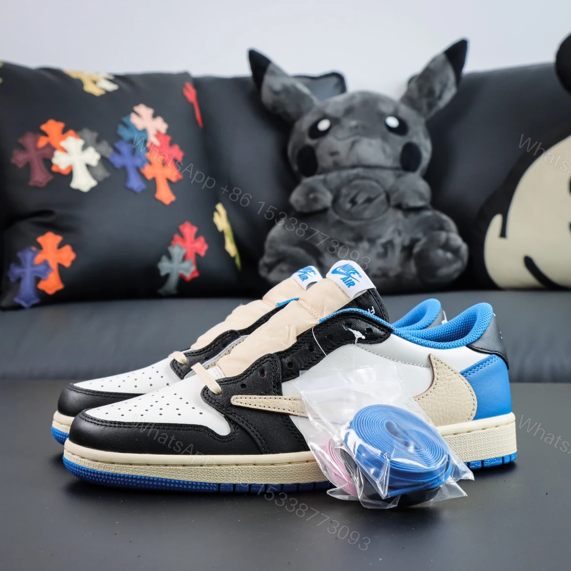 View 8 of Travis Scott Fragment Design Jordan 1 Reps Low​