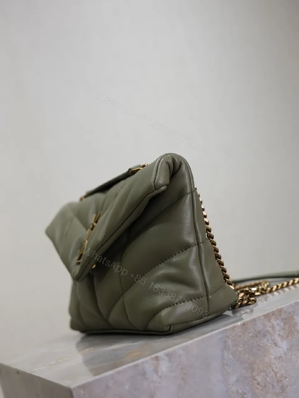 View 8 of Textured Olive Quilted Shoulder Bag with Gold Emblem, Compact Elegant Style