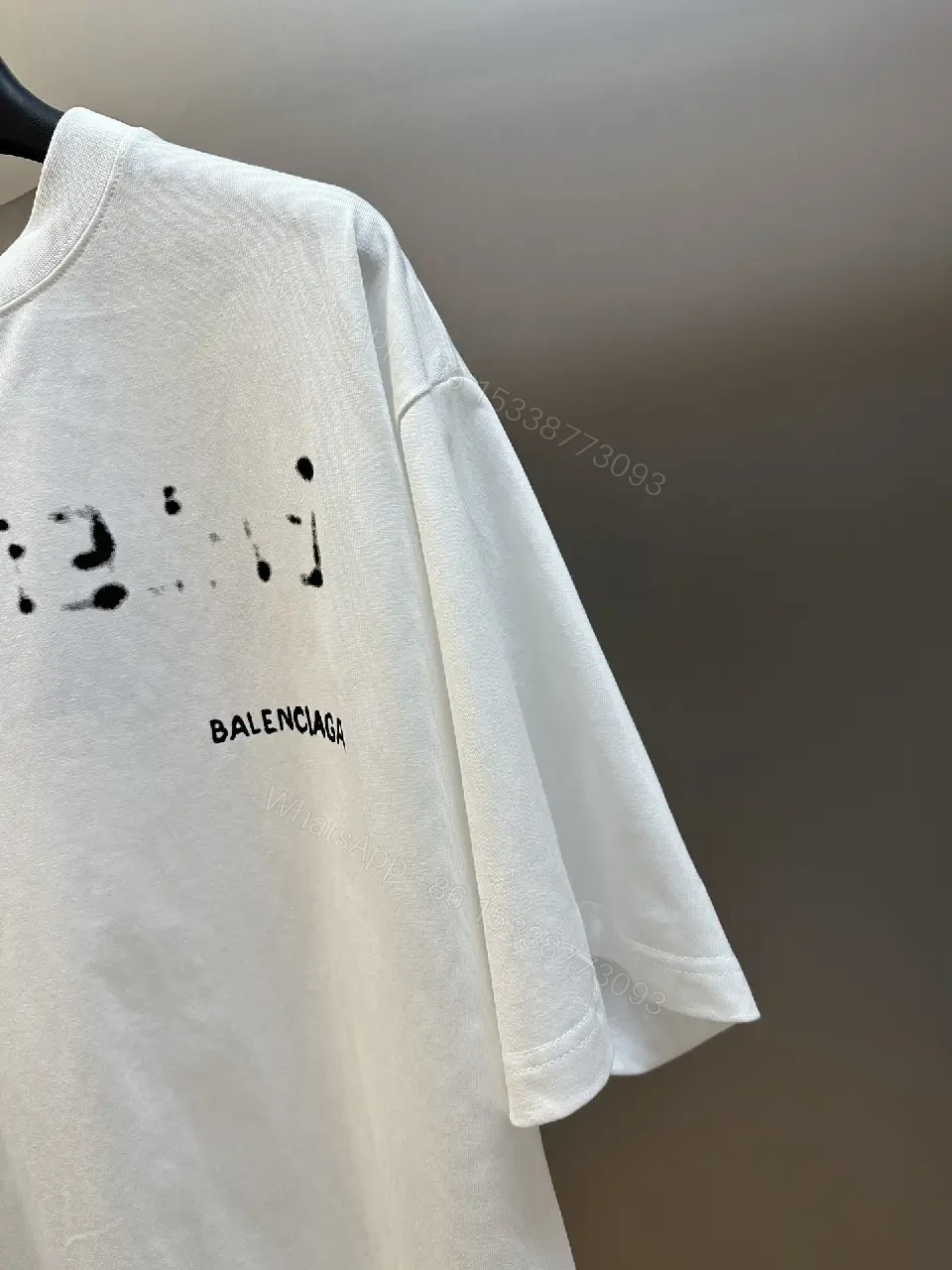 View 6 of Oversized Graphic Tee with Subtle Distress and Logo – Premium Cotton