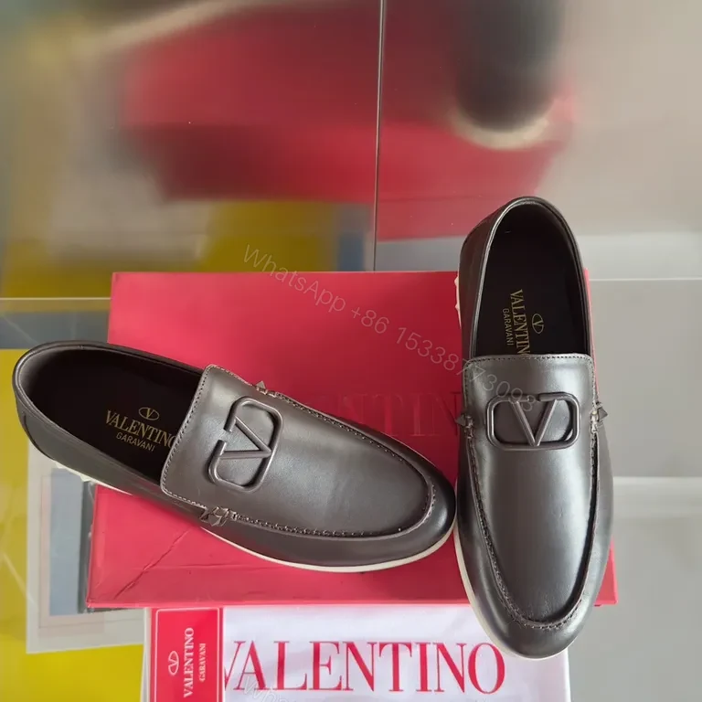 View 7 of Sleek Leather Loafers with Signature Hardware, Black, Luxury Style