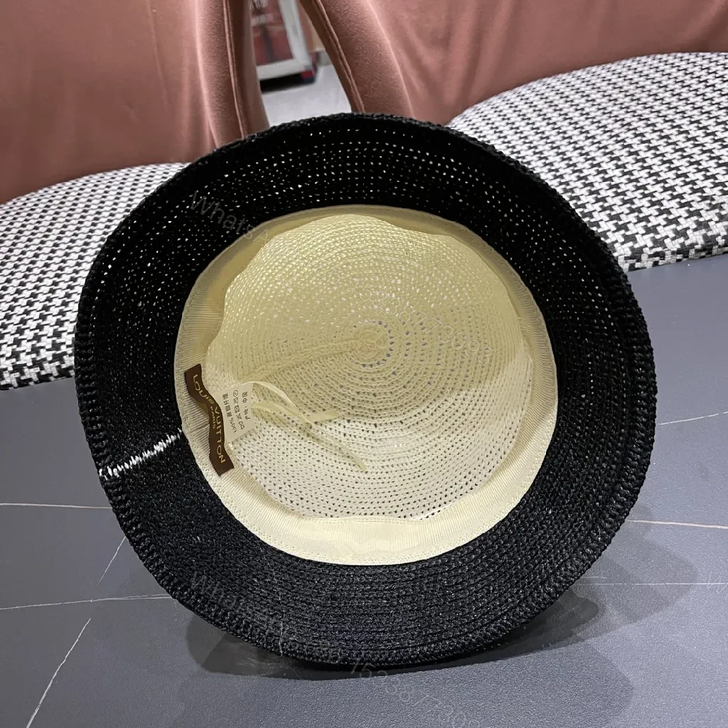View 9 of Chic Straw Bucket Hat with Subtle Luxury Accent