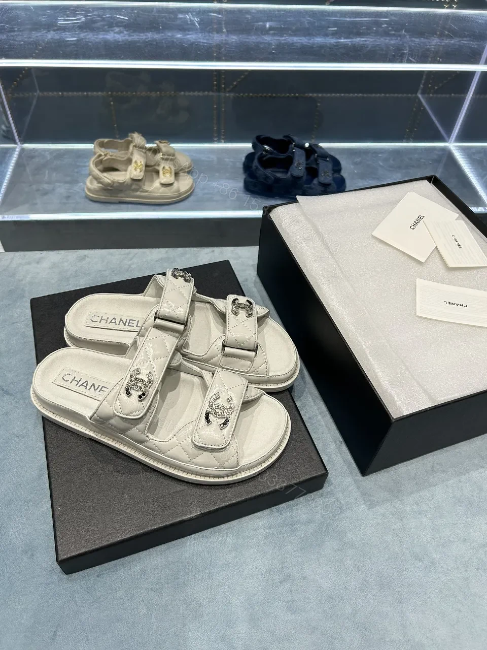 View 8 of Chic White Sandals with Quilted Straps and Logo Hardware