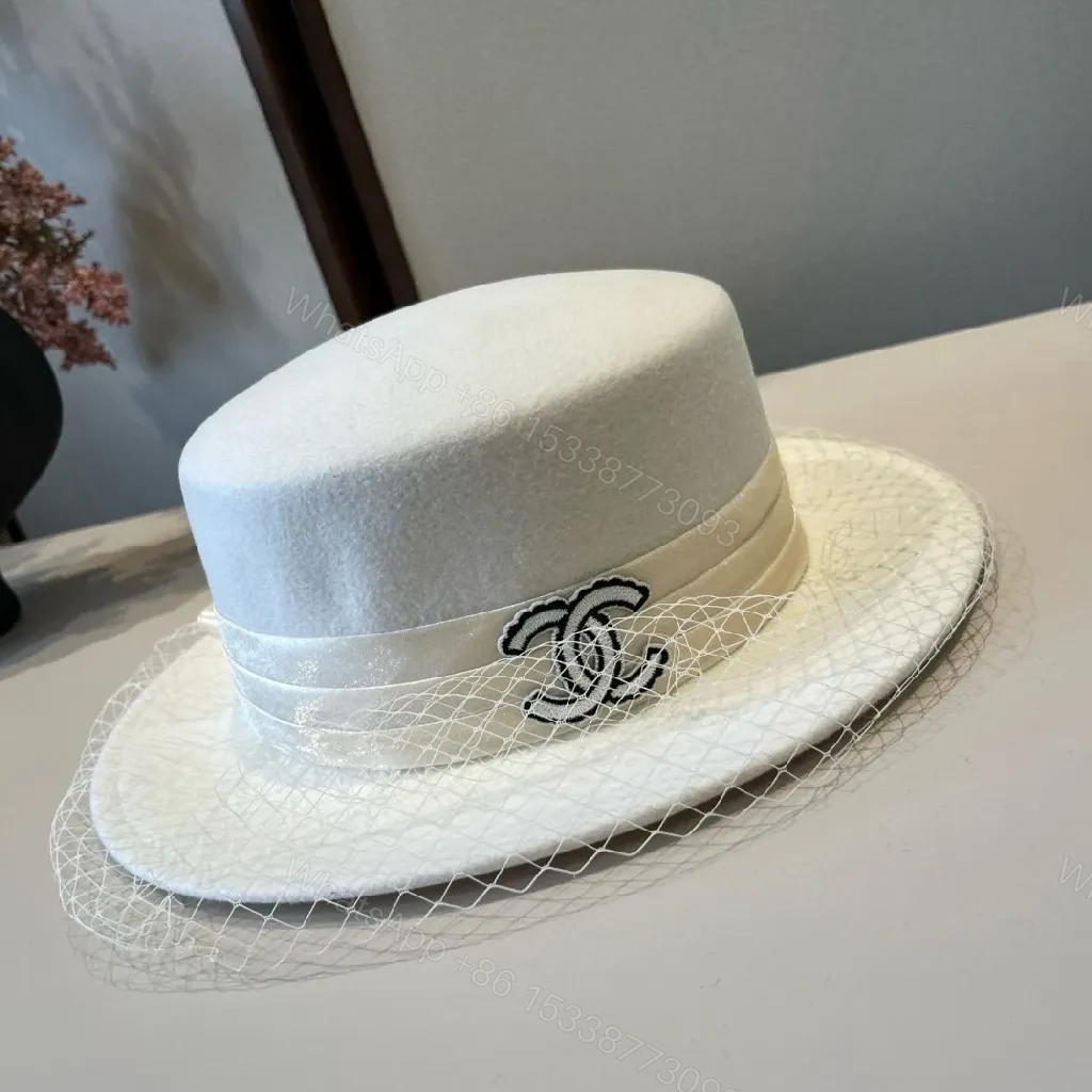 View 7 of Ivory Felt Fedora with Veil & Emblem Accent