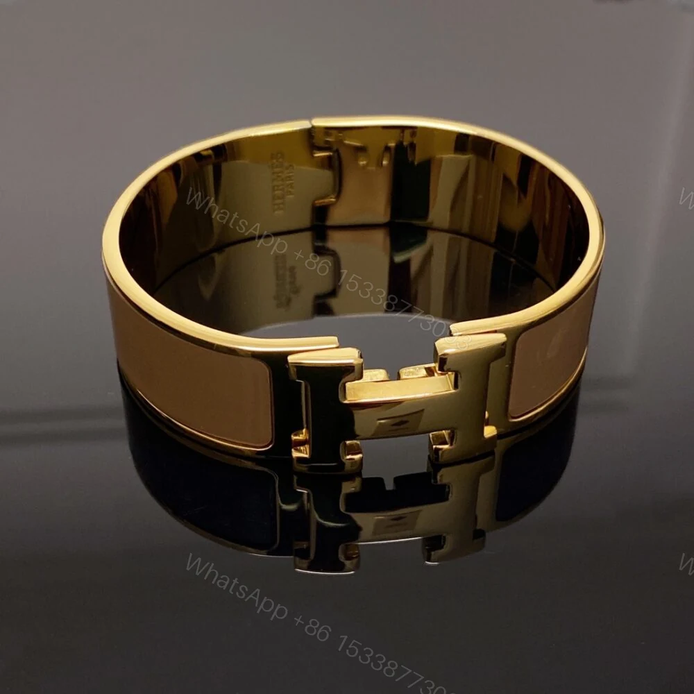 View 8 of Hermes Clic H Wide Bracelet Gold & Beige