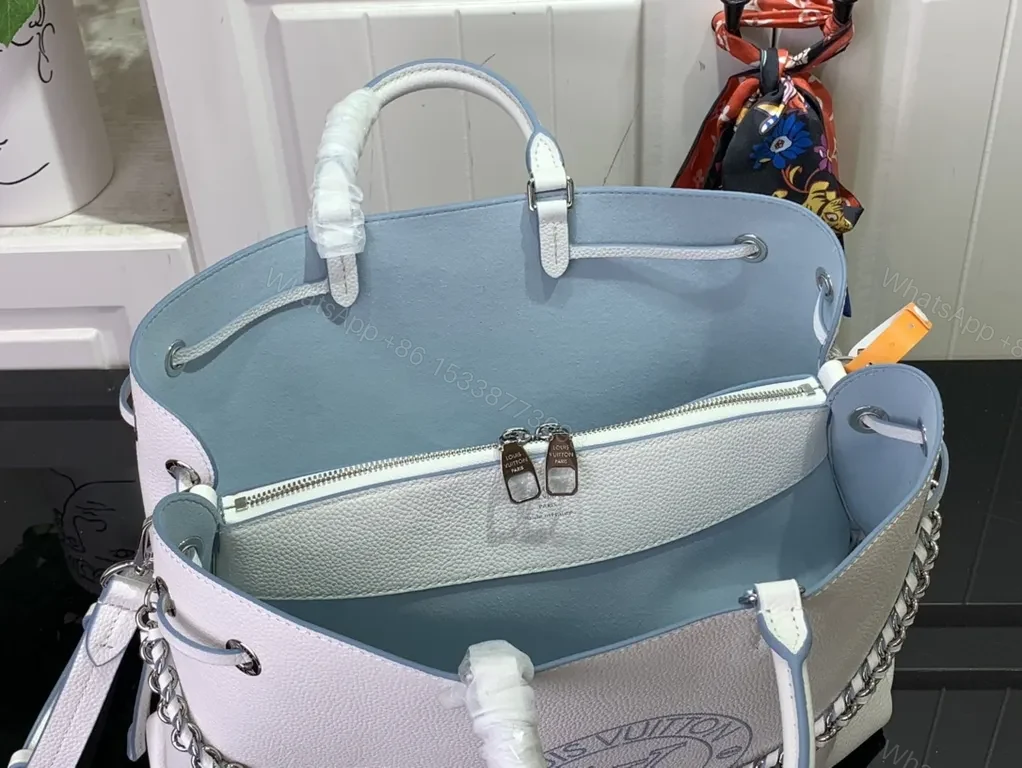 View 5 of Pebbled Leather Tote: LV Emblem, Structured, Spacious Carrier