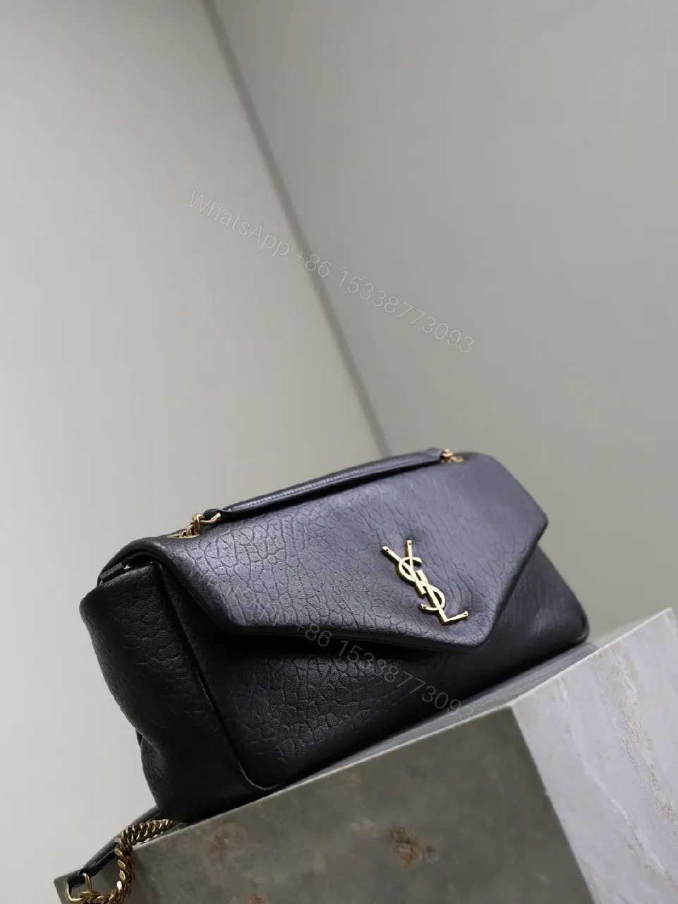 View 4 of Textured Leather Crossbody Clutch with Gold Logo hardware