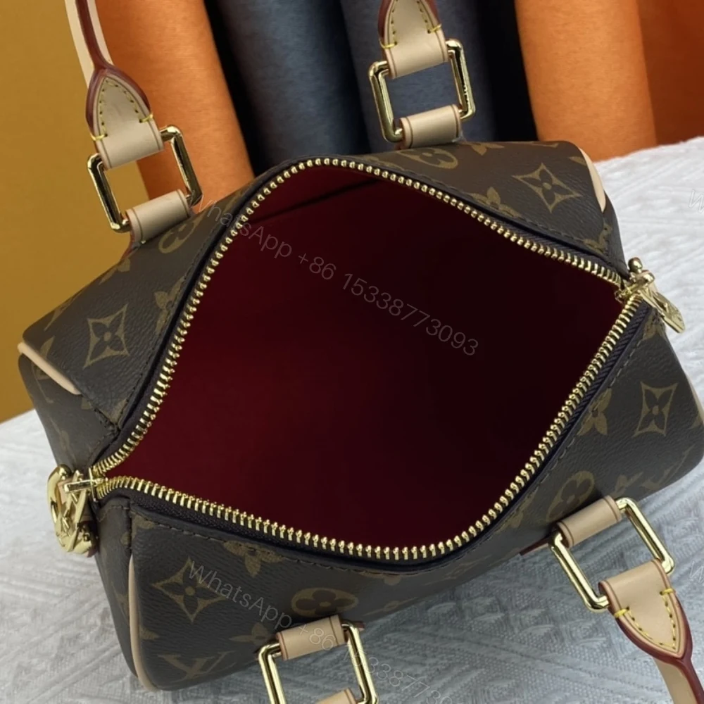 View 7 of Louis Vuitton Speedy Bandoulière 20 Fuchsia 25Cm M45948