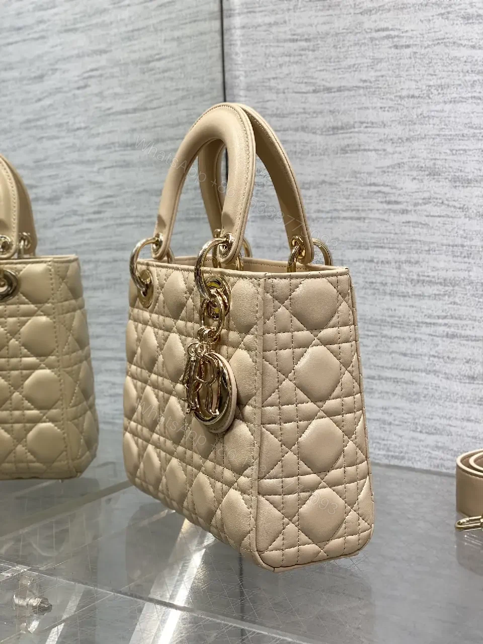 View 4 of Beige Quilted Leather Handbag with Top Handle for Everyday Luxury