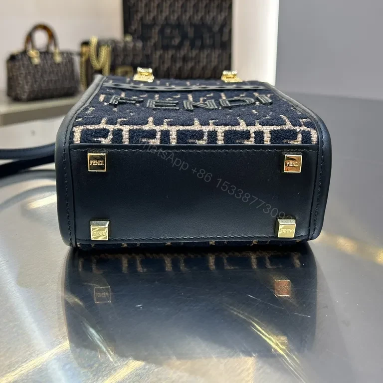 View 8 of Chic Monogram Mini Handbag: Luxe Texture & Structured Carry