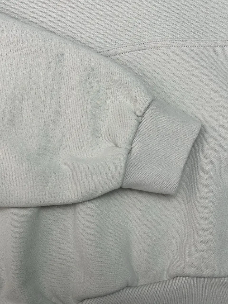 View 7 of Neutral Cotton Blend Minimalist Hoodie with Subtle Logo (Unisex)