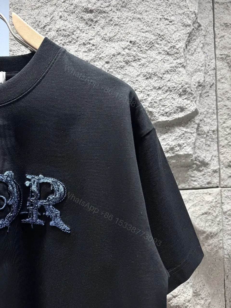 View 10 of Bold DIOR Lettering Tee - Textured Luxe Streetwear, Black, Unisex