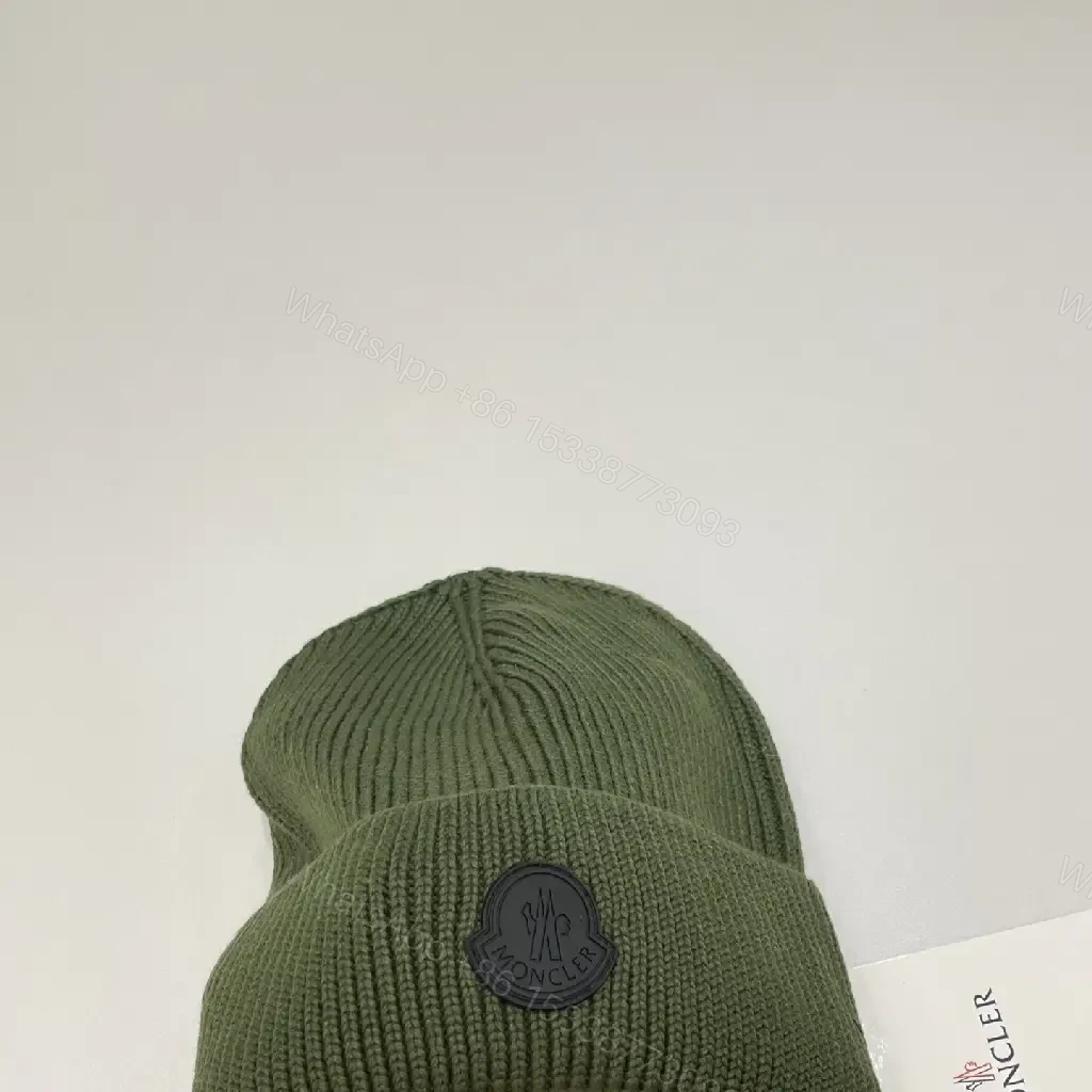View 9 of Textured Knit Beanie - Luxe Wool, Ribbed Style, Subtle Logo, All-Season Warmth