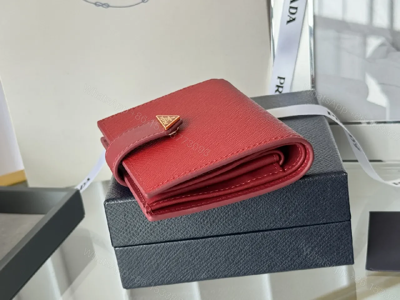 View 10 of Bold Red Saffiano Wallet: Compact Luxury for Everyday Use
