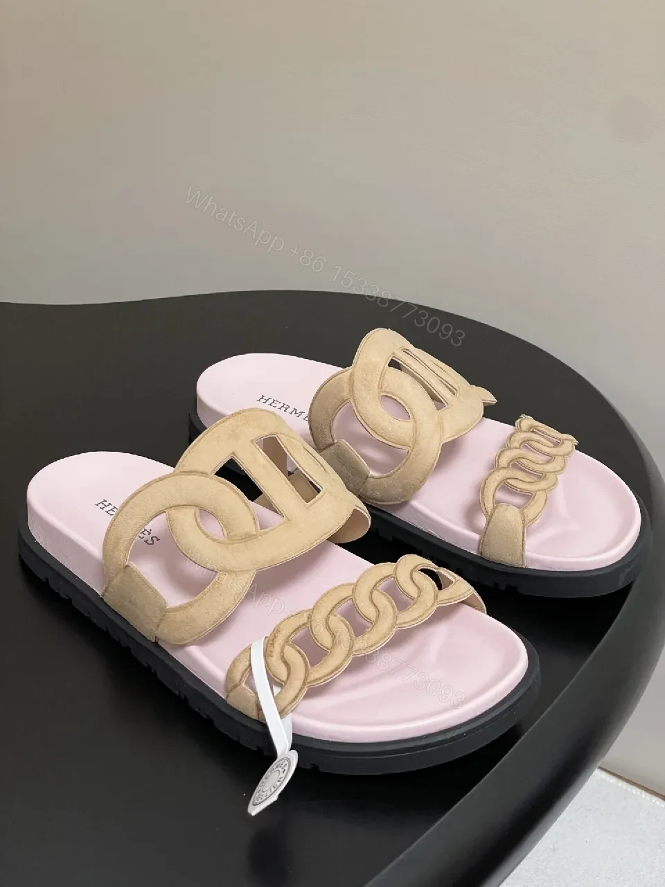 View 3 of Soft Pink Leather Slides with Signature Interlaced Straps