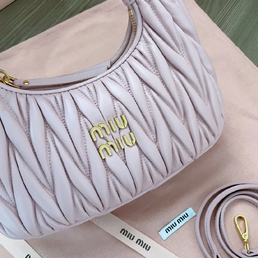 View 4 of Soft-Quilted Lavender Mini Bag: Luxury-Texture, Gold Hardware, Crossbody
