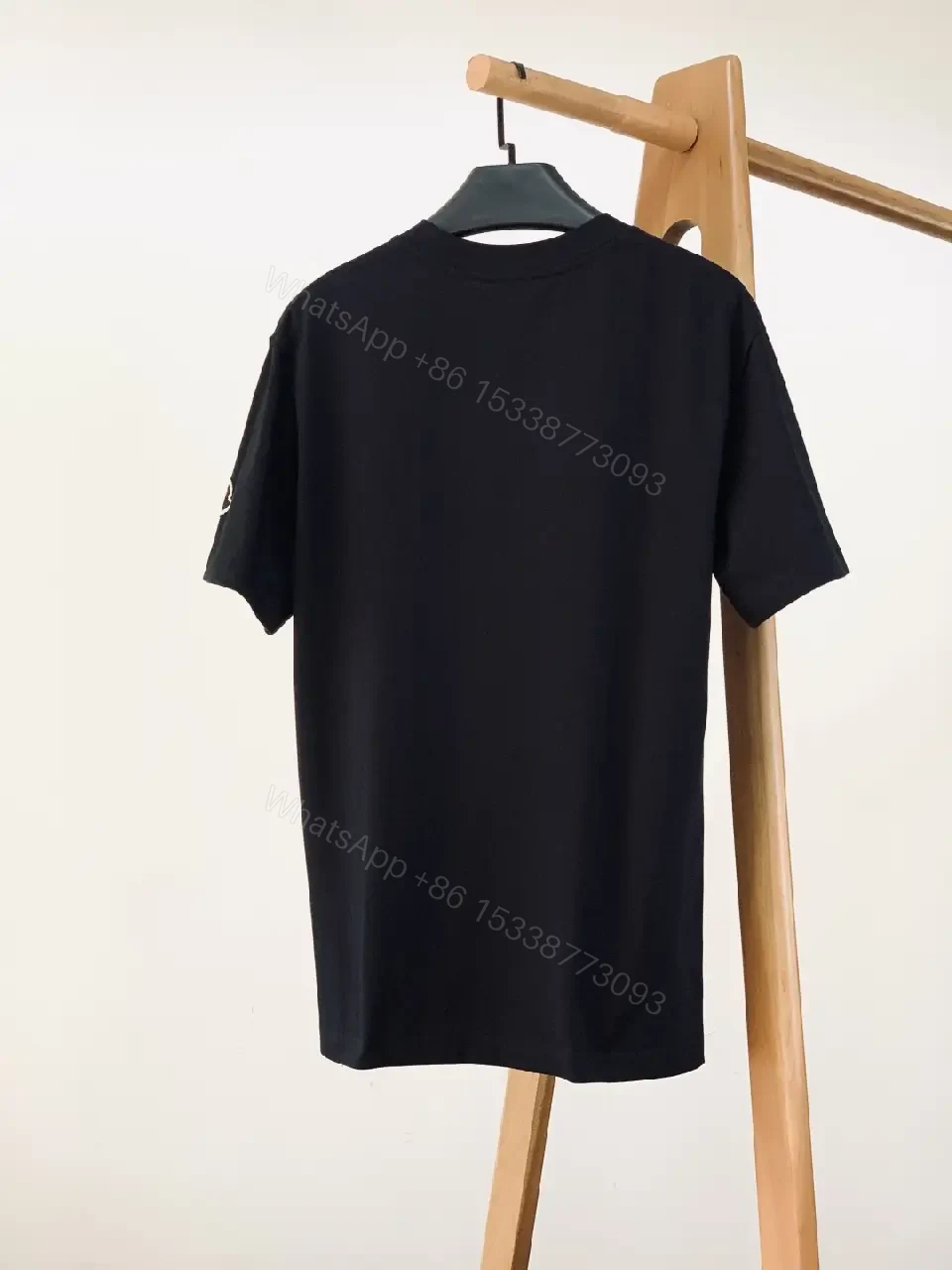 View 9 of Premium Logo Tee: Black Cotton Crewneck, Modern Luxe, Unisex Product Type